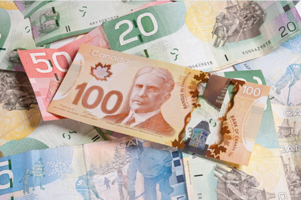  الدولار أمريكي / دولار كندي USD / CAD في ذروته الشهرية ، والمضاربون على الصعود ينتظرون قوة مستمرة تتجاوز علامة 1.3000